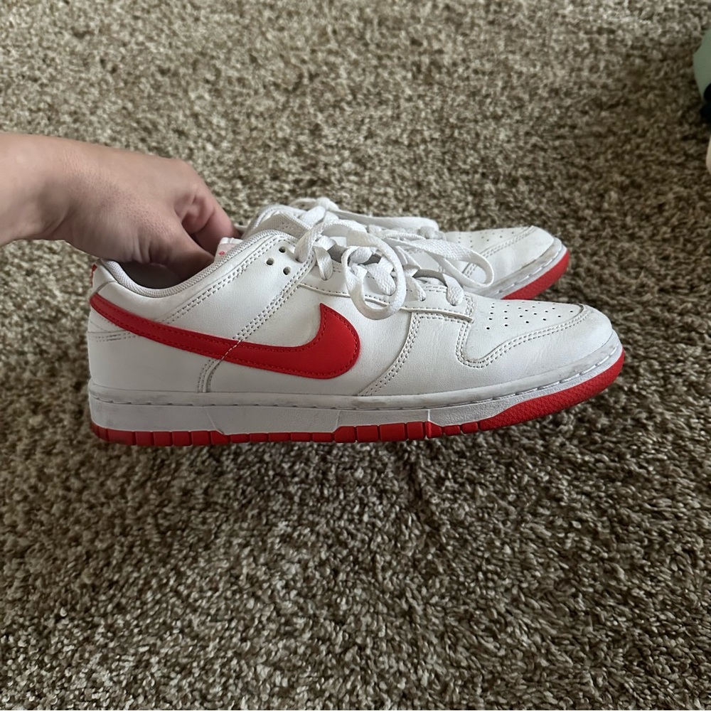 Nike White Low-Top Sneakers with Red Swoosh